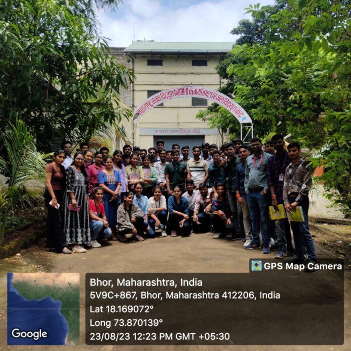 Group of students exploring turbines and machinery at the Bhatghar Hydroelectric Power Station during an educational visit